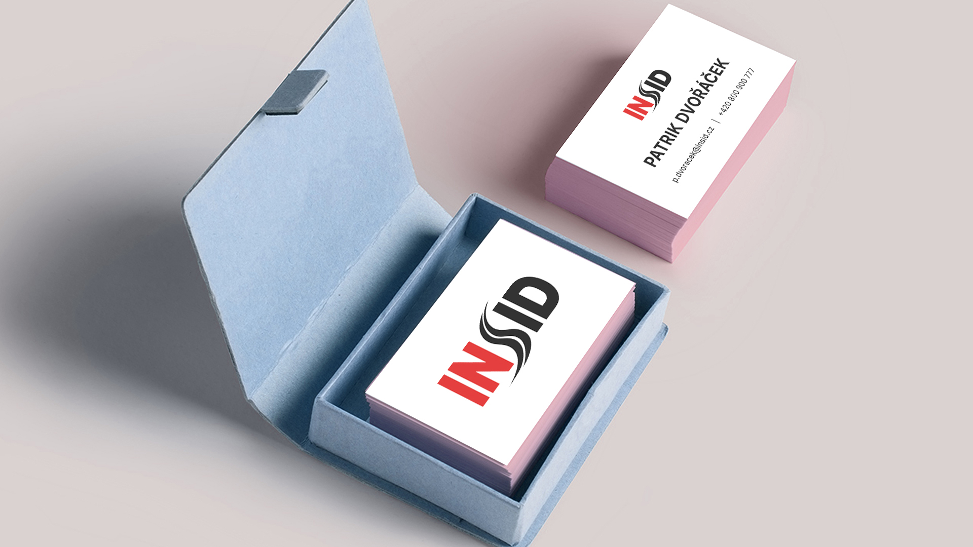 a box with a stack of business cards