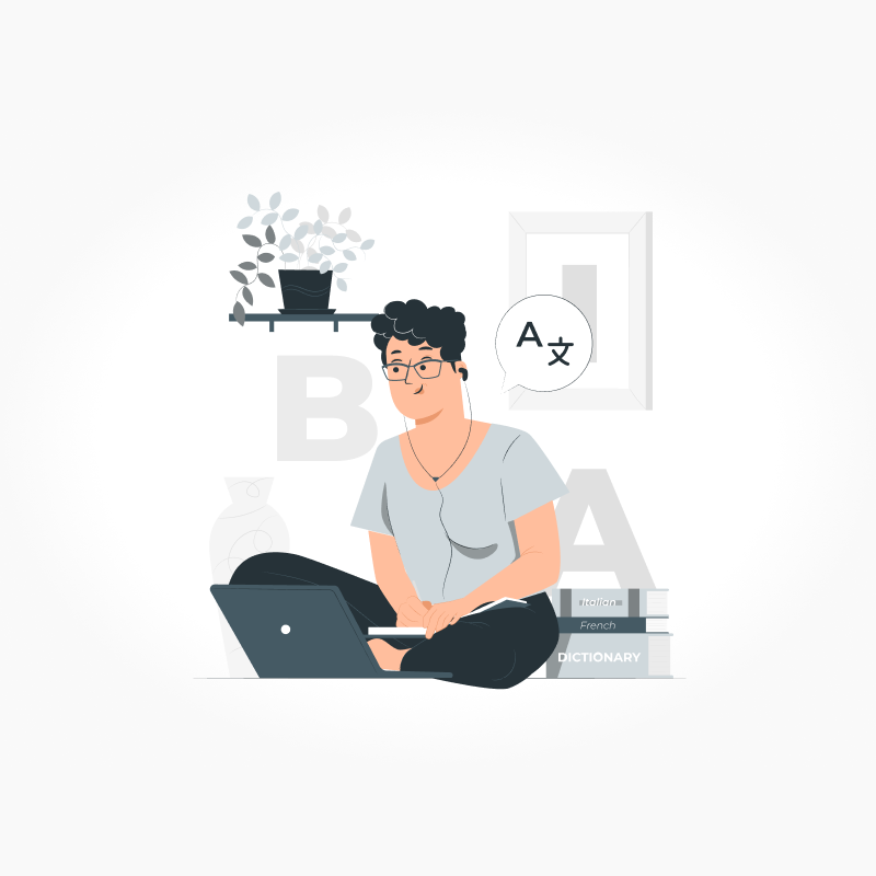 Člověk sedící na zemi s notebookem